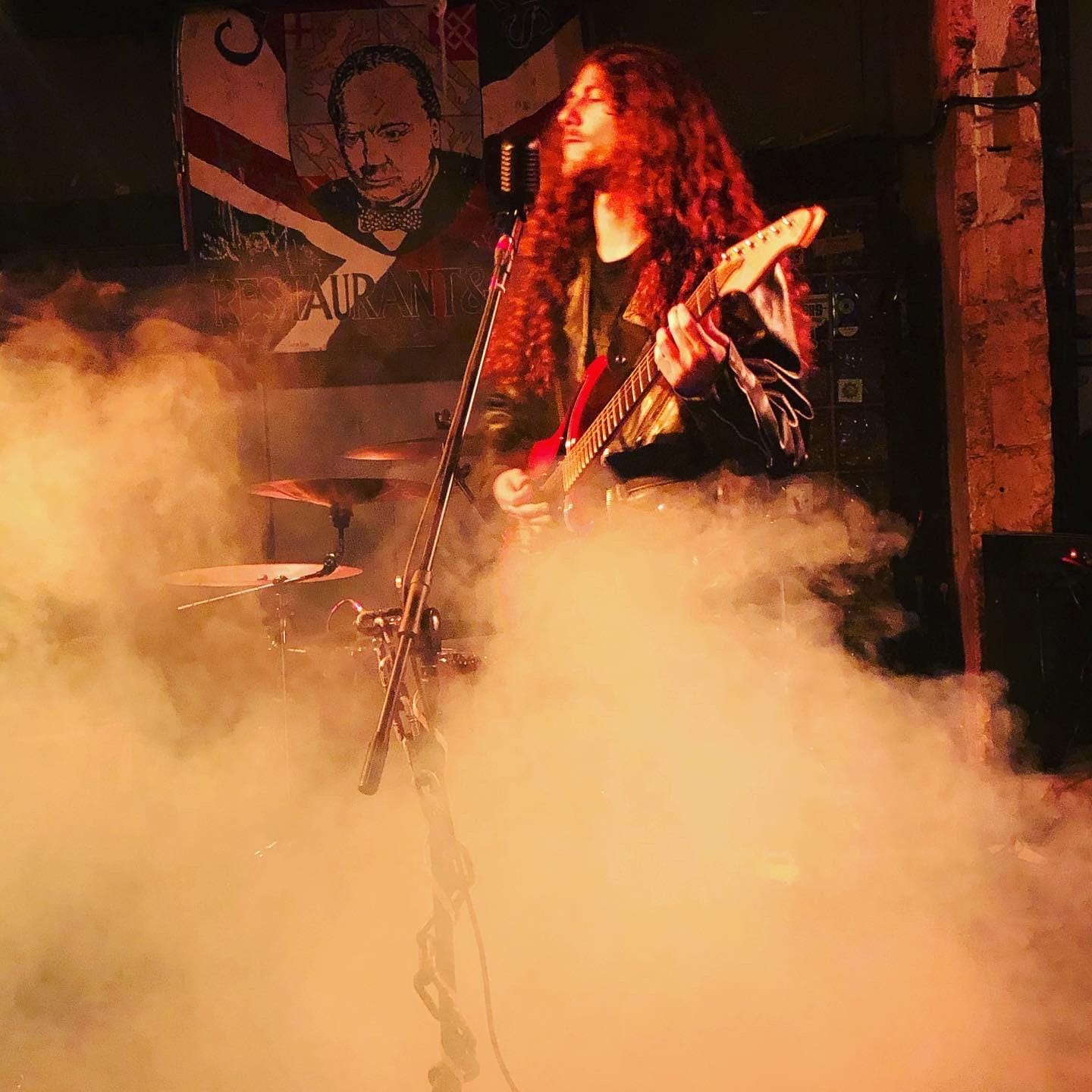 Chris Clark performing live